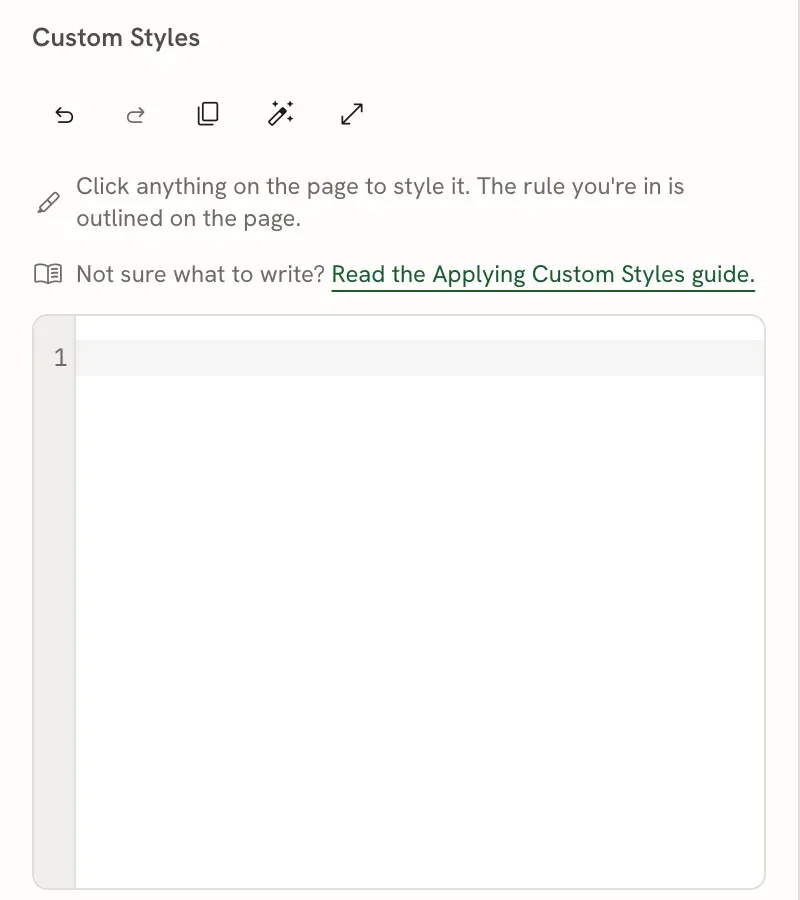 The Custom styles heading with a toolbar of five icons (undo, redo, copy, format, focus mode), two hint lines, and an empty code editor