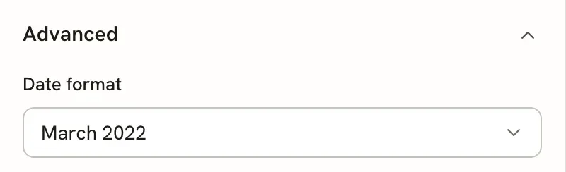 The Advanced group in Design mode, with a Date format dropdown set to March 2022.