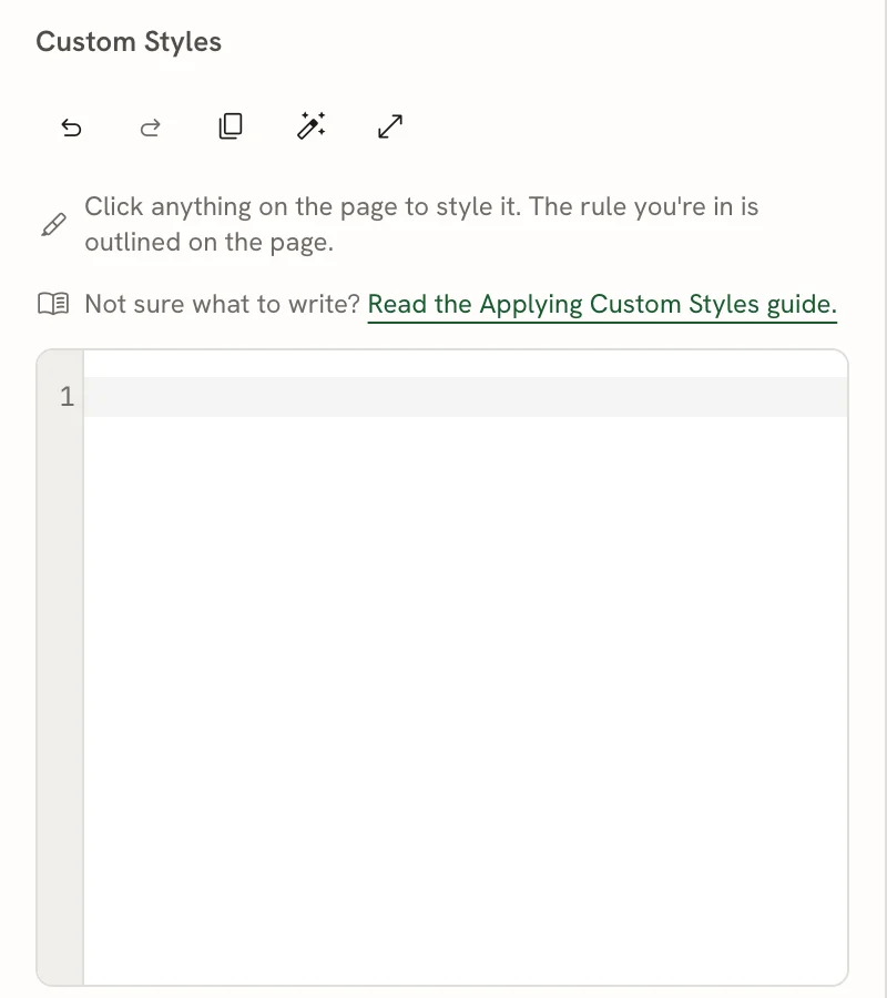 The Custom styles heading with a toolbar of five icons (undo, redo, copy, format, focus mode), two hint lines, and an empty code editor